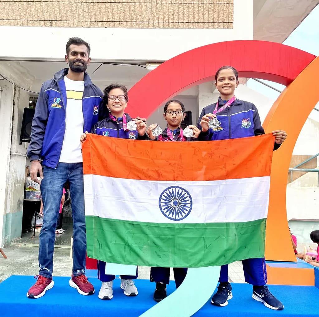 Athletes from Rule The Ropes with national flag and international medals